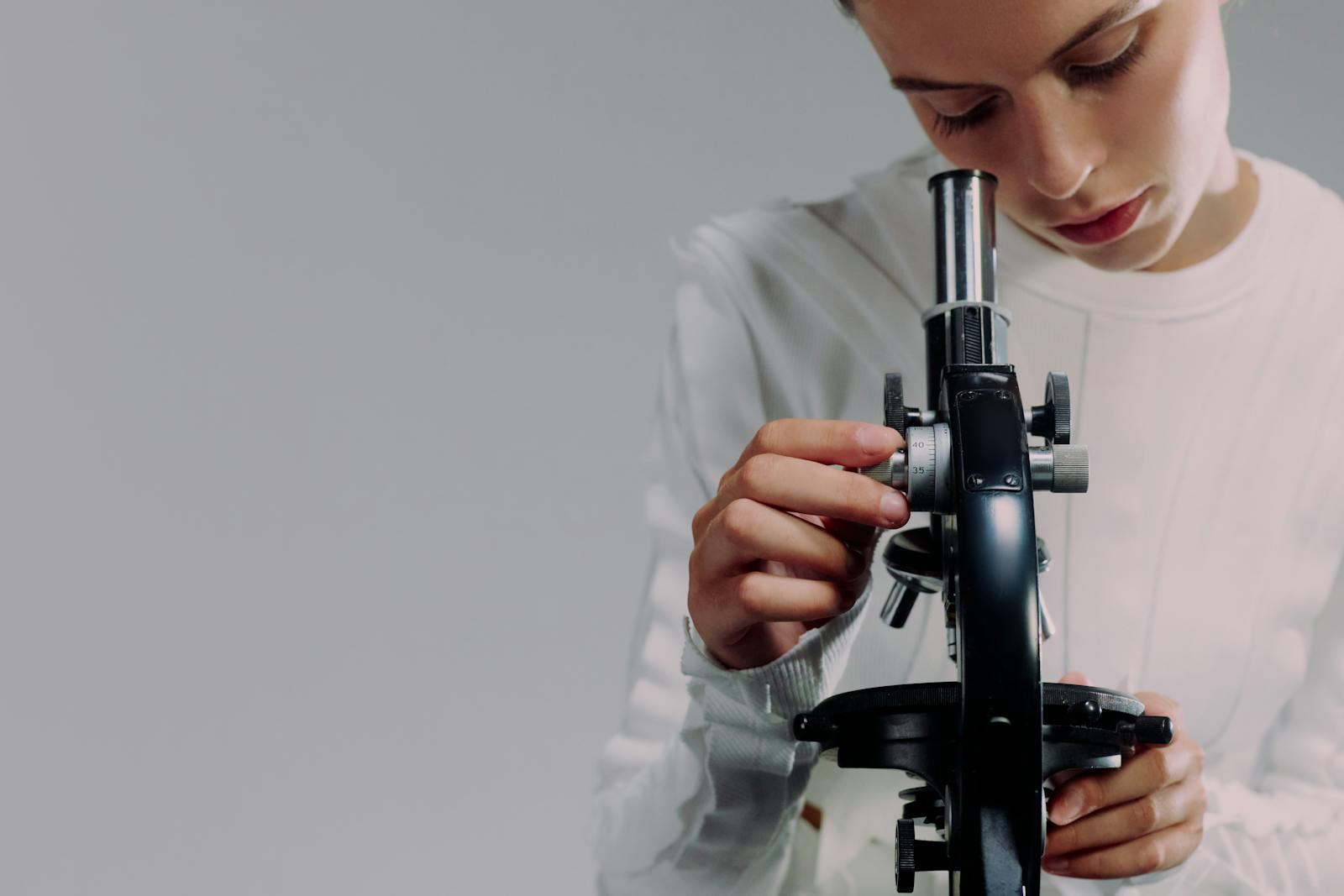 Laboratory team using microscope for quality and research work